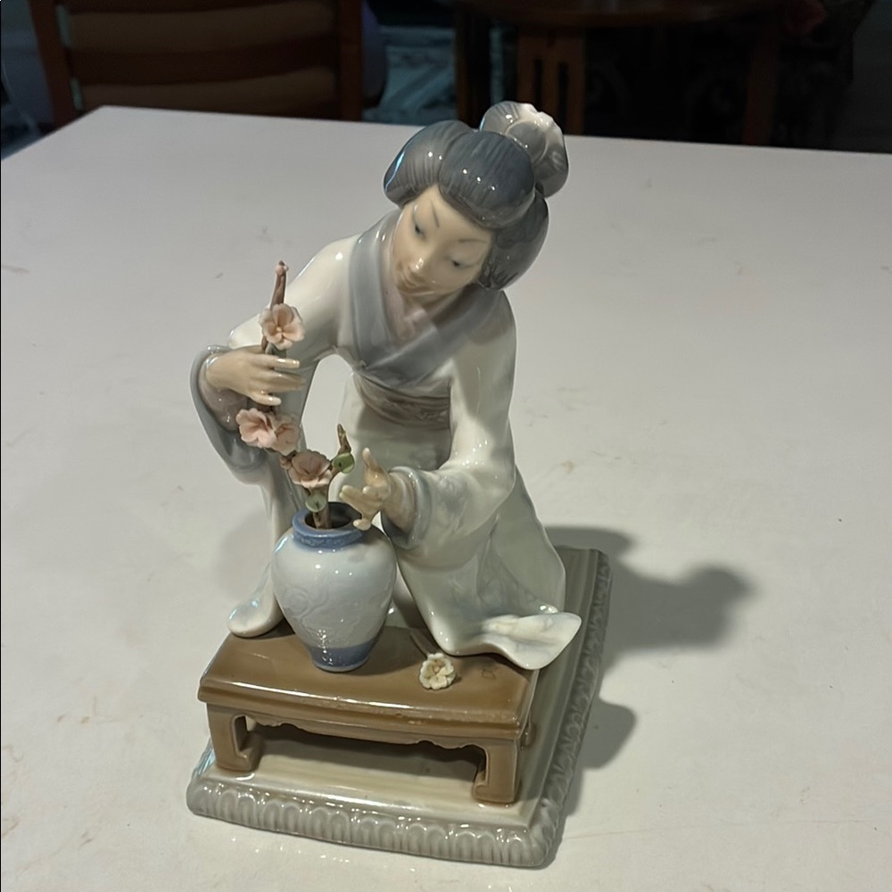 Lladro Porcelain Figurine with Floral Vase